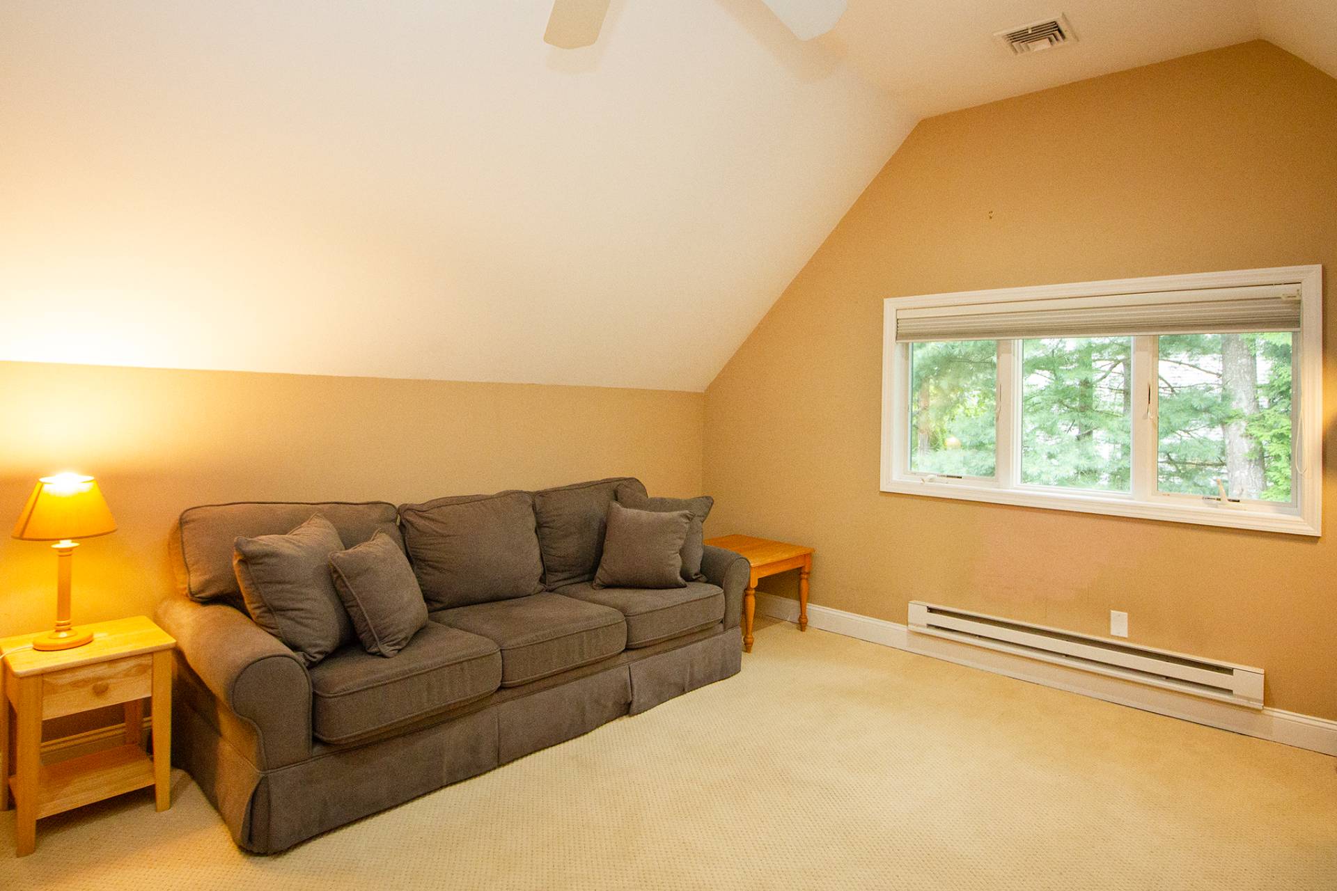 49 Bridle Path Westhampton Beach, NY 11978 - Photo 20 of 29 a living room with furniture and a window
