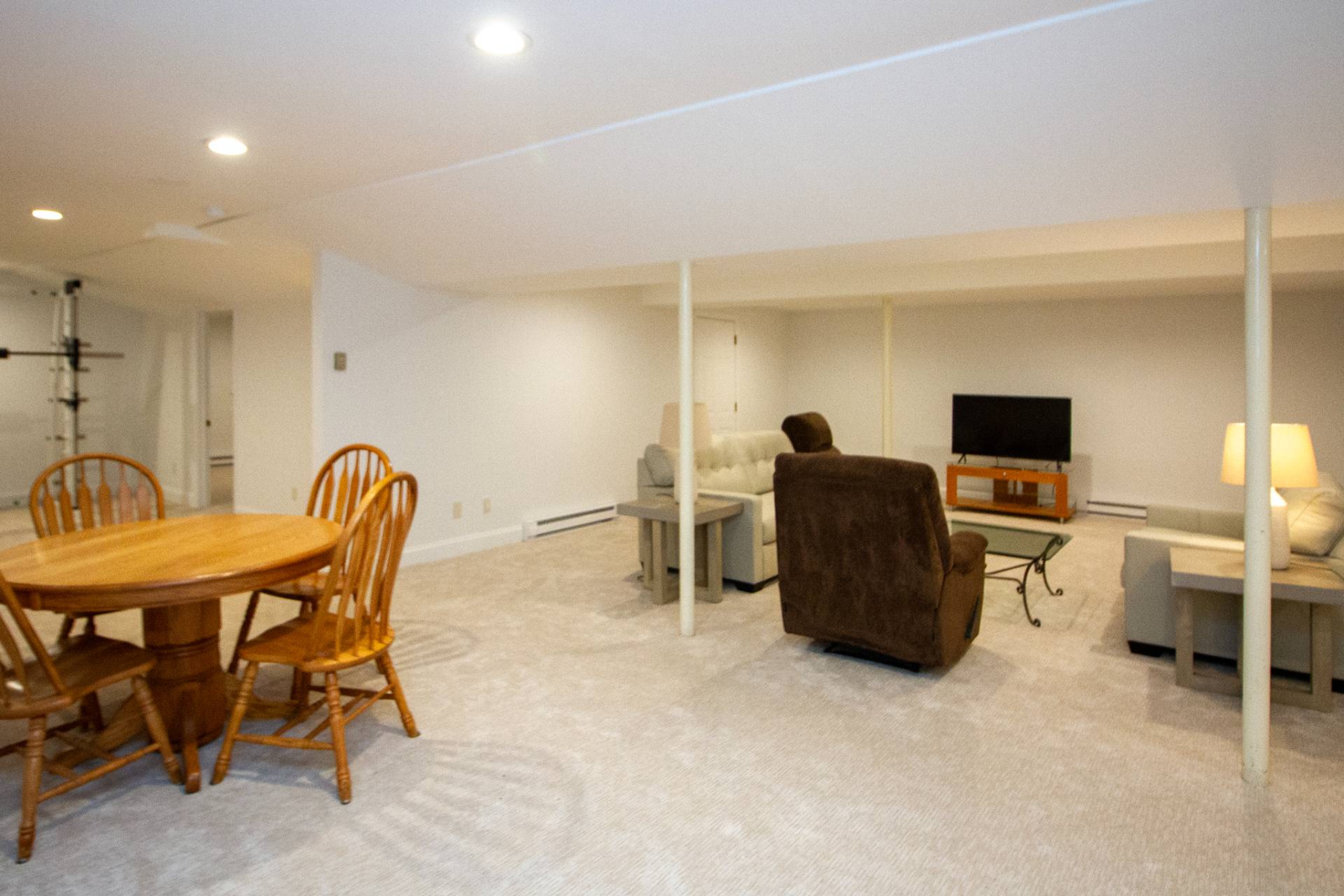 49 Bridle Path Westhampton Beach, NY 11978 - Photo 22 of 29 a dining room with furniture and natural light