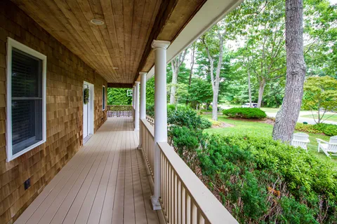a view of a garden from a balcony