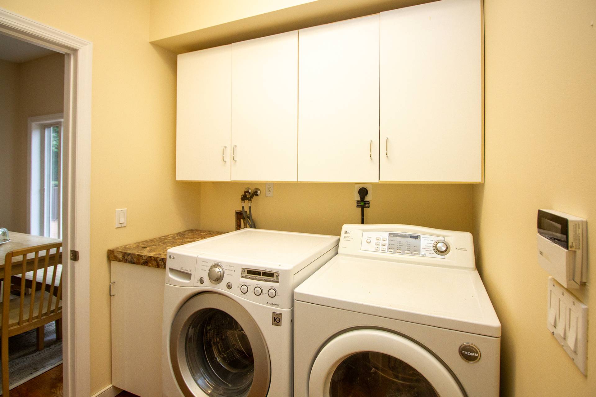 49 Bridle Path Westhampton Beach, NY 11978 - Photo 9 of 29 a utility room with dryer and washer