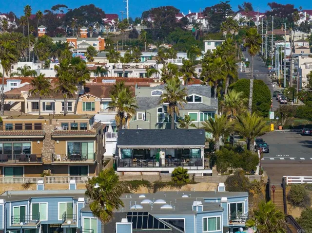 a view of house with outdoor seating