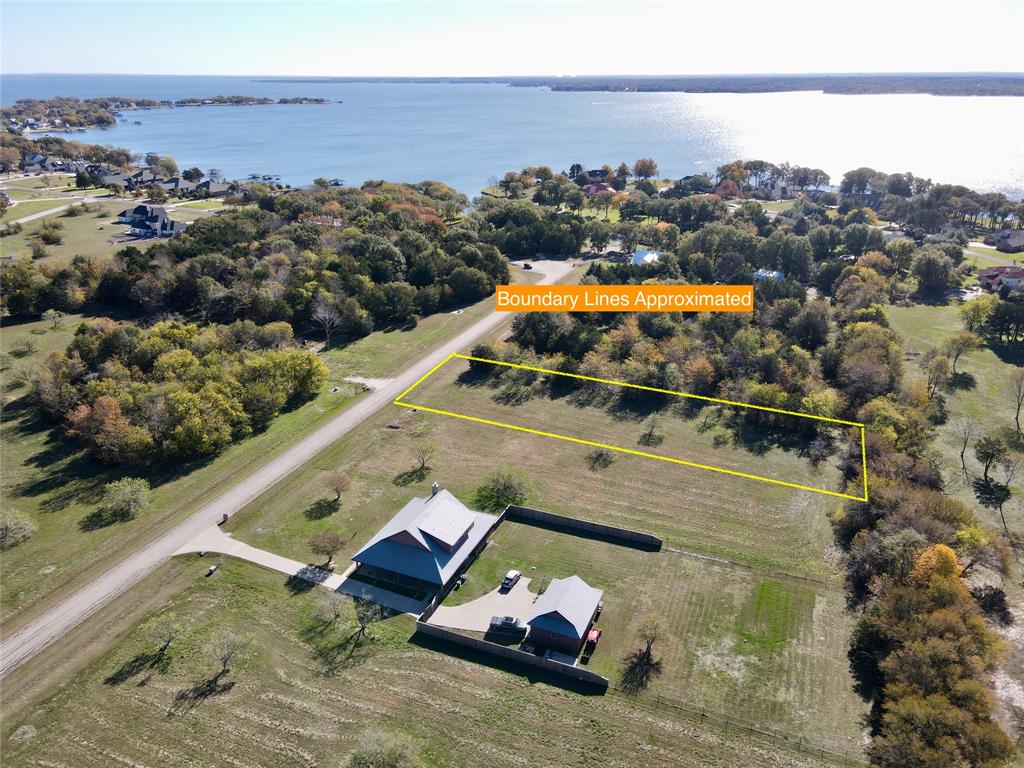 Lot 182-bs Lot 182-bs Cove Corsicana, TX 75109 - Photo 1 of 38 an aerial view of a house with a ocean view