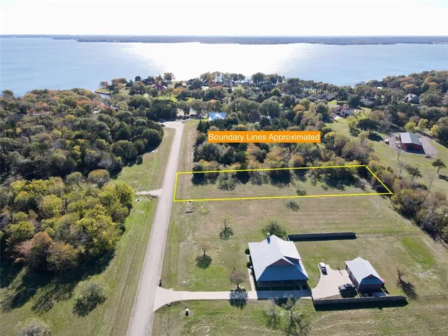 a view of a green field with clear sky