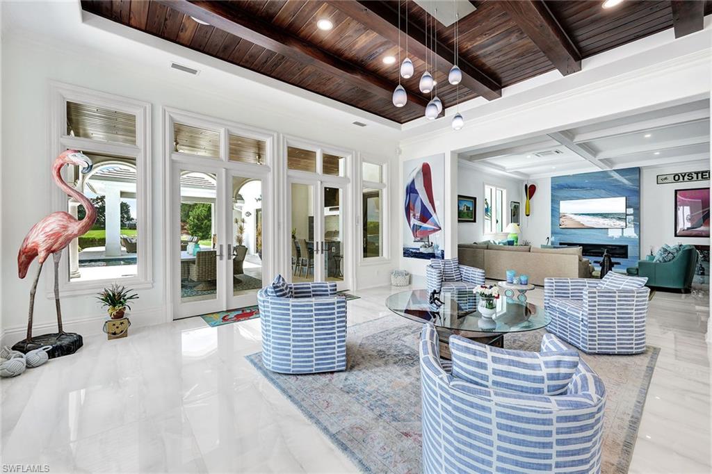 16770 Prato Way Naples, FL 34110 - Photo 8 of 29 a living room with furniture