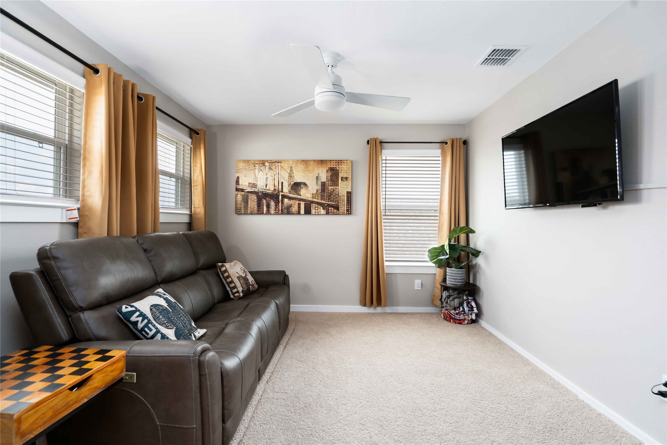 8414 Bay Rdg Circle Baytown, TX 77523 - Photo 14 of 35 a living room with furniture and a flat screen tv