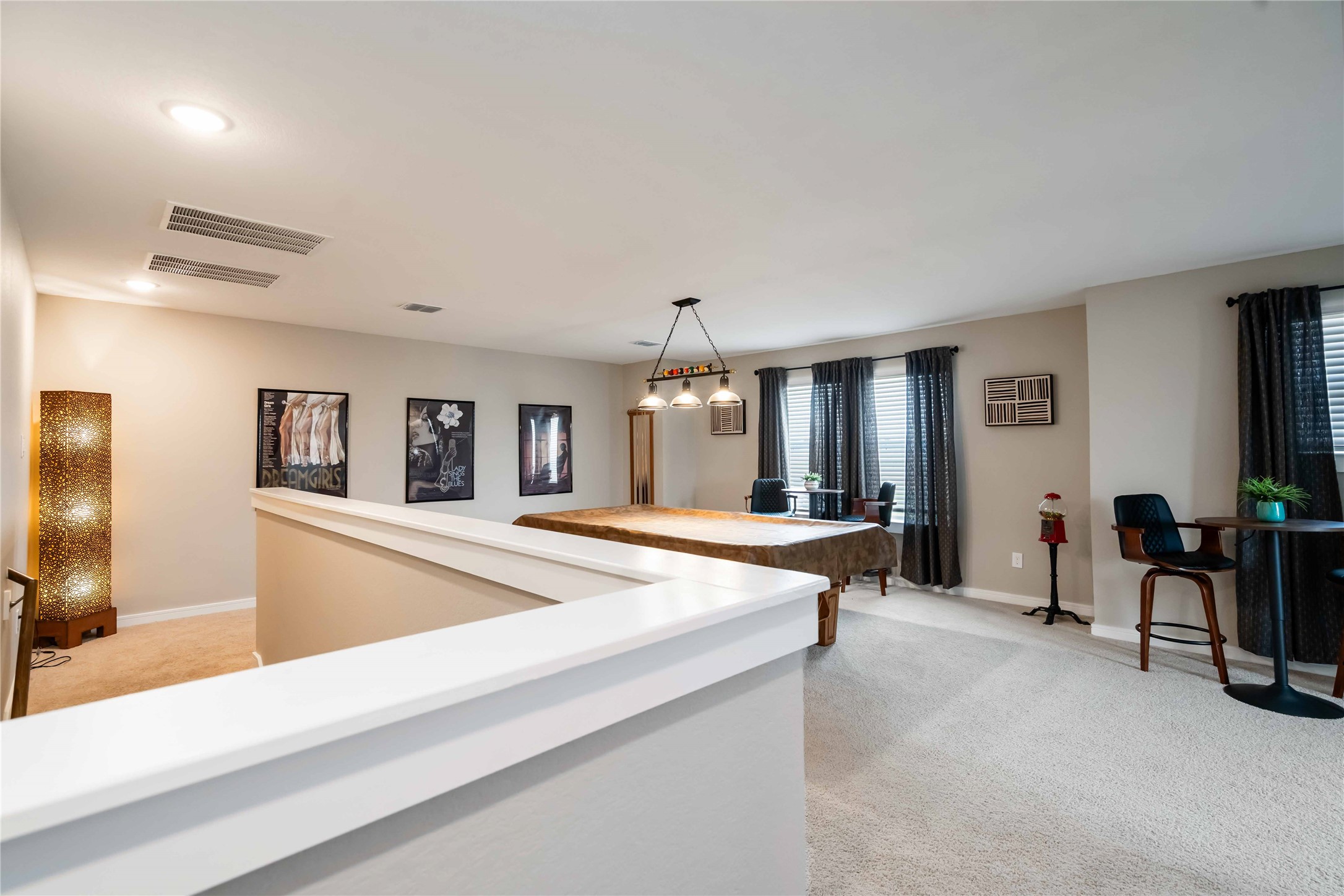 8414 Bay Rdg Circle Baytown, TX 77523 - Photo 19 of 35 a living room with furniture and a chandelier