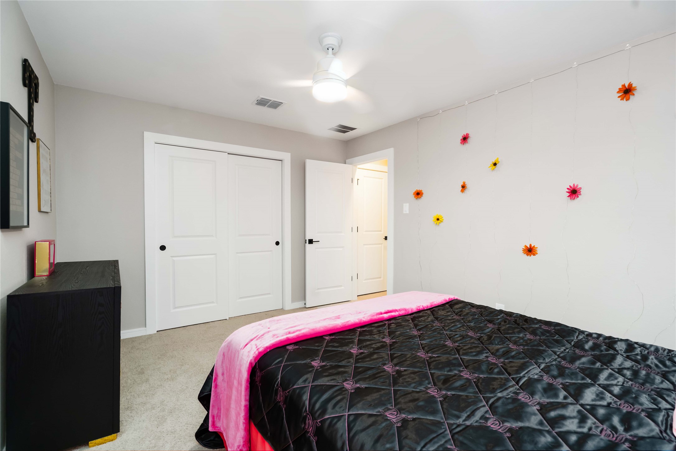 8414 Bay Rdg Circle Baytown, TX 77523 - Photo 23 of 35 a bedroom with a bed and a flat tv screen