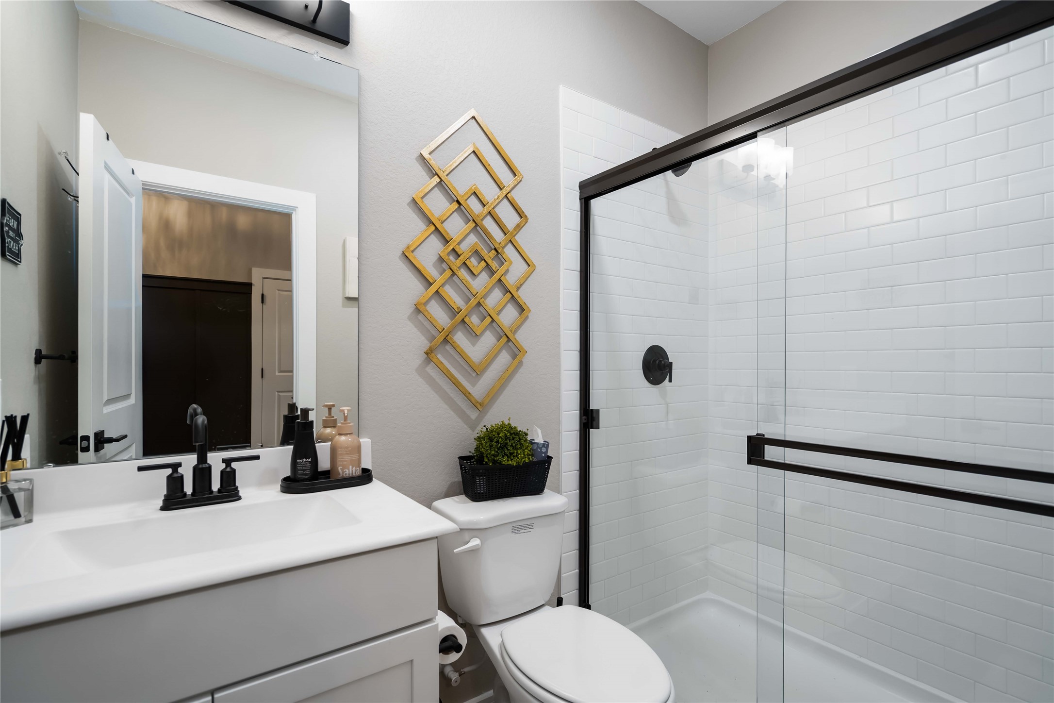 8414 Bay Rdg Circle Baytown, TX 77523 - Photo 26 of 35 a bathroom with a sink toilet and shower