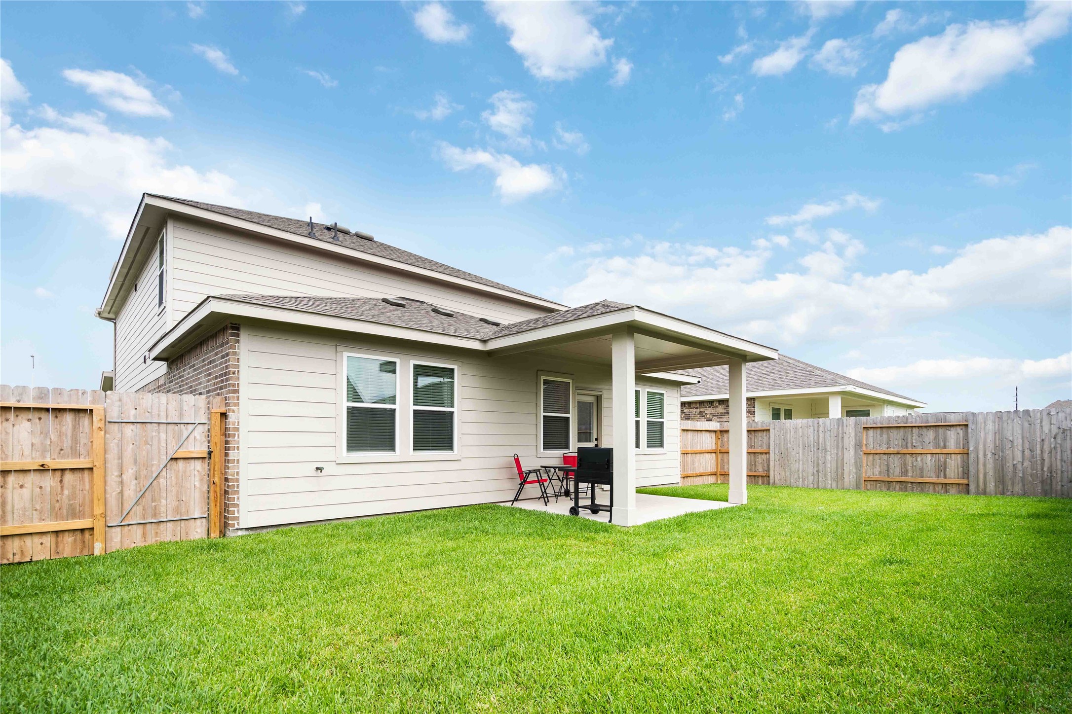 8414 Bay Rdg Circle Baytown, TX 77523 - Photo 34 of 35 a view of a house with a backyard