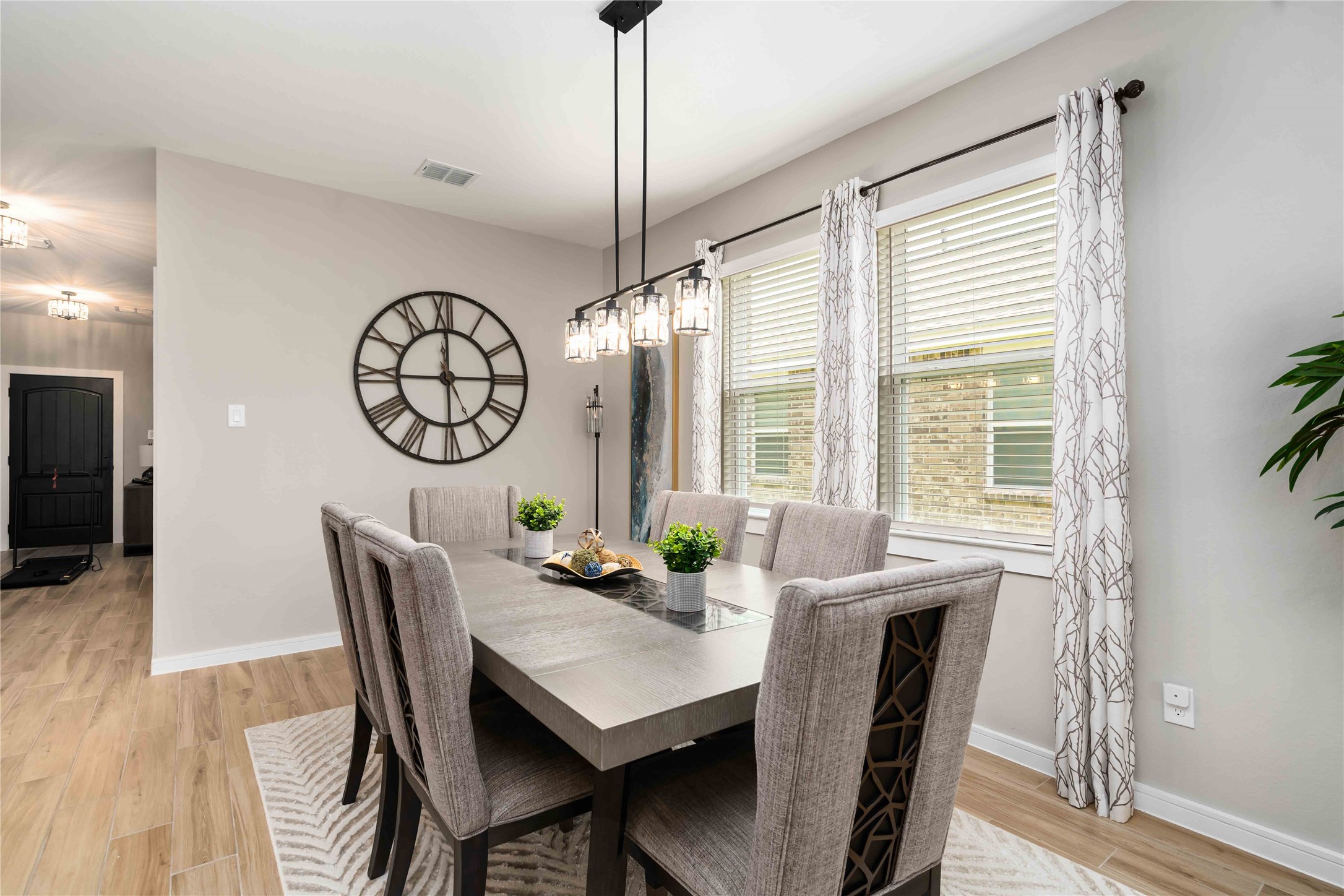 8414 Bay Rdg Circle Baytown, TX 77523 - Photo 10 of 35 a view of a dining room with furniture window and wooden floor