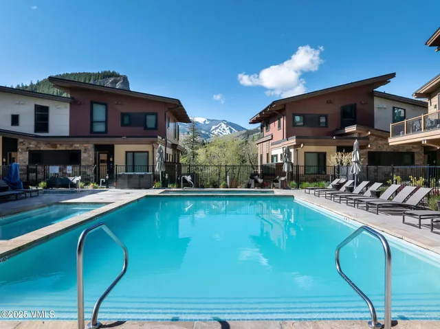 a view of a house with swimming pool