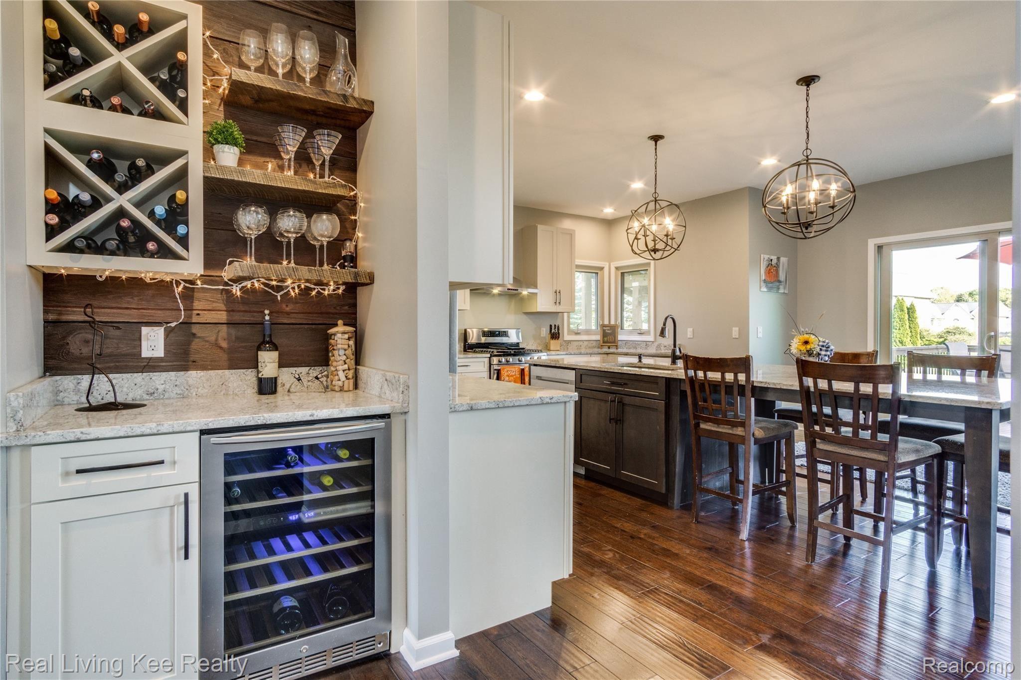 3975 May Center Road Lake Orion, MI 48360 - Photo 23 of 48 Tasteful Wine Nook with reclaimed wood.