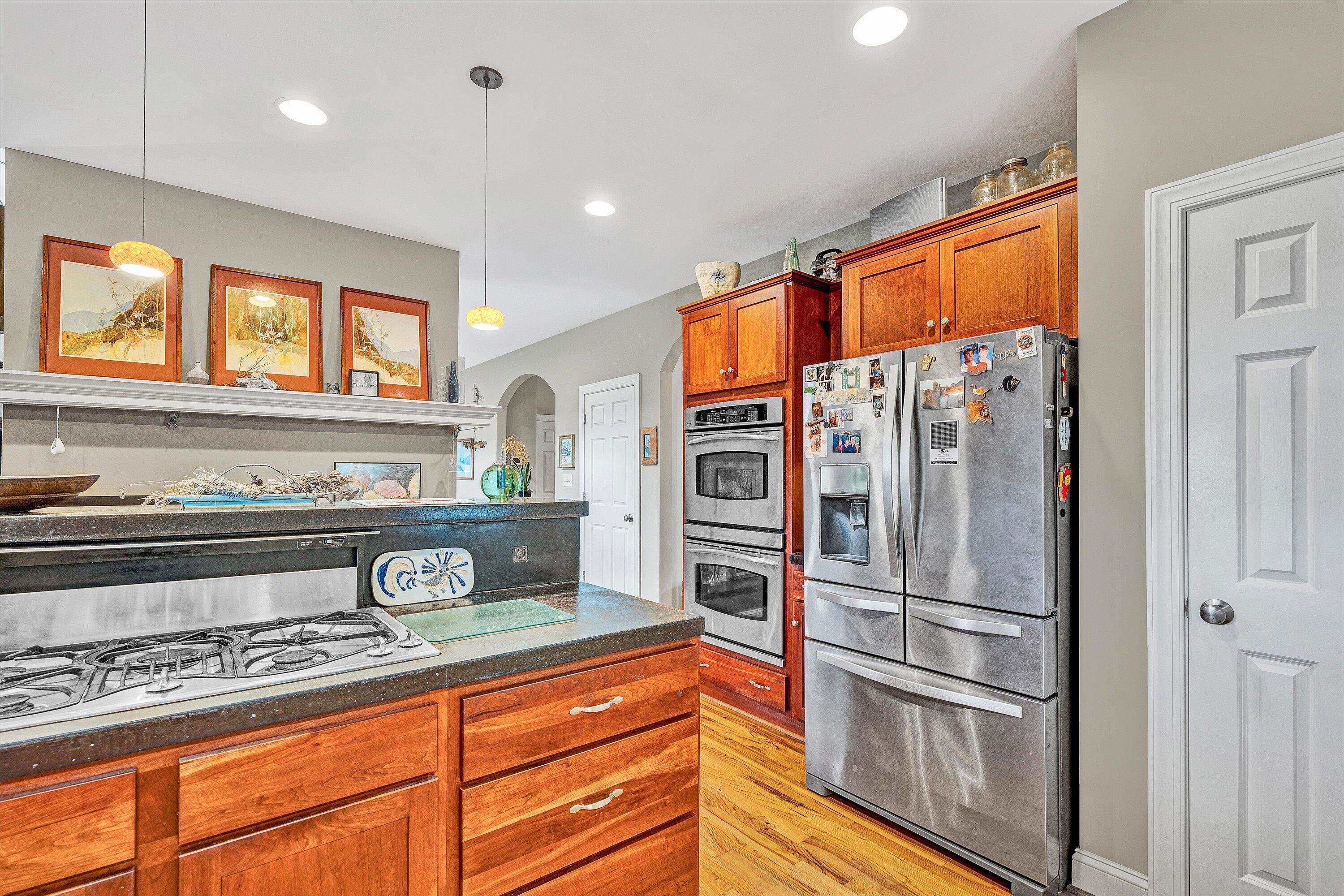 84 Green Level Road Boones Mill, VA 24065 - Photo 17 of 56 a kitchen with stainless steel appliances granite countertop a refrigerator and a sink