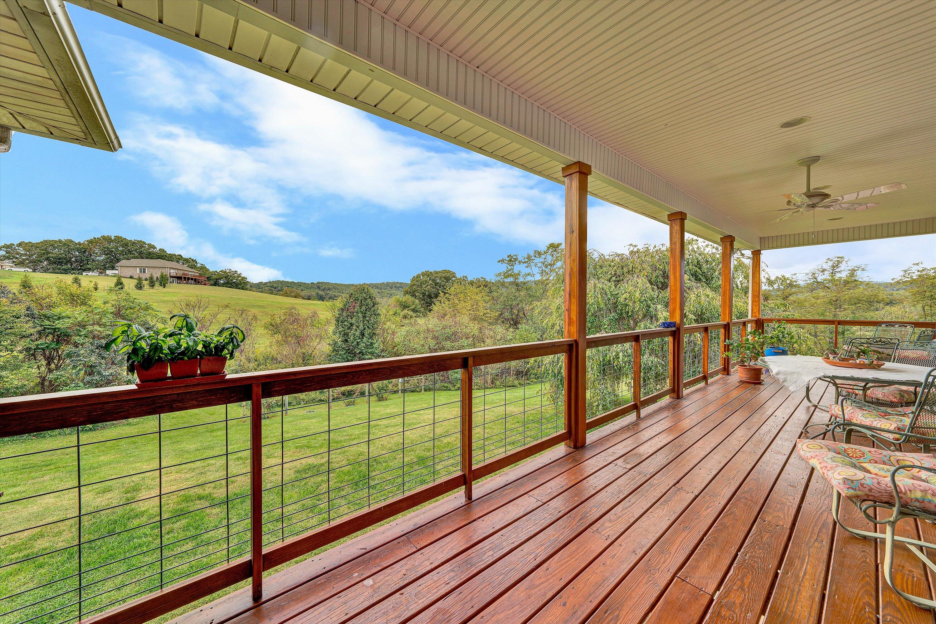 84 Green Level Road Boones Mill, VA 24065 - Photo 21 of 56 a view of a balcony with wooden floor