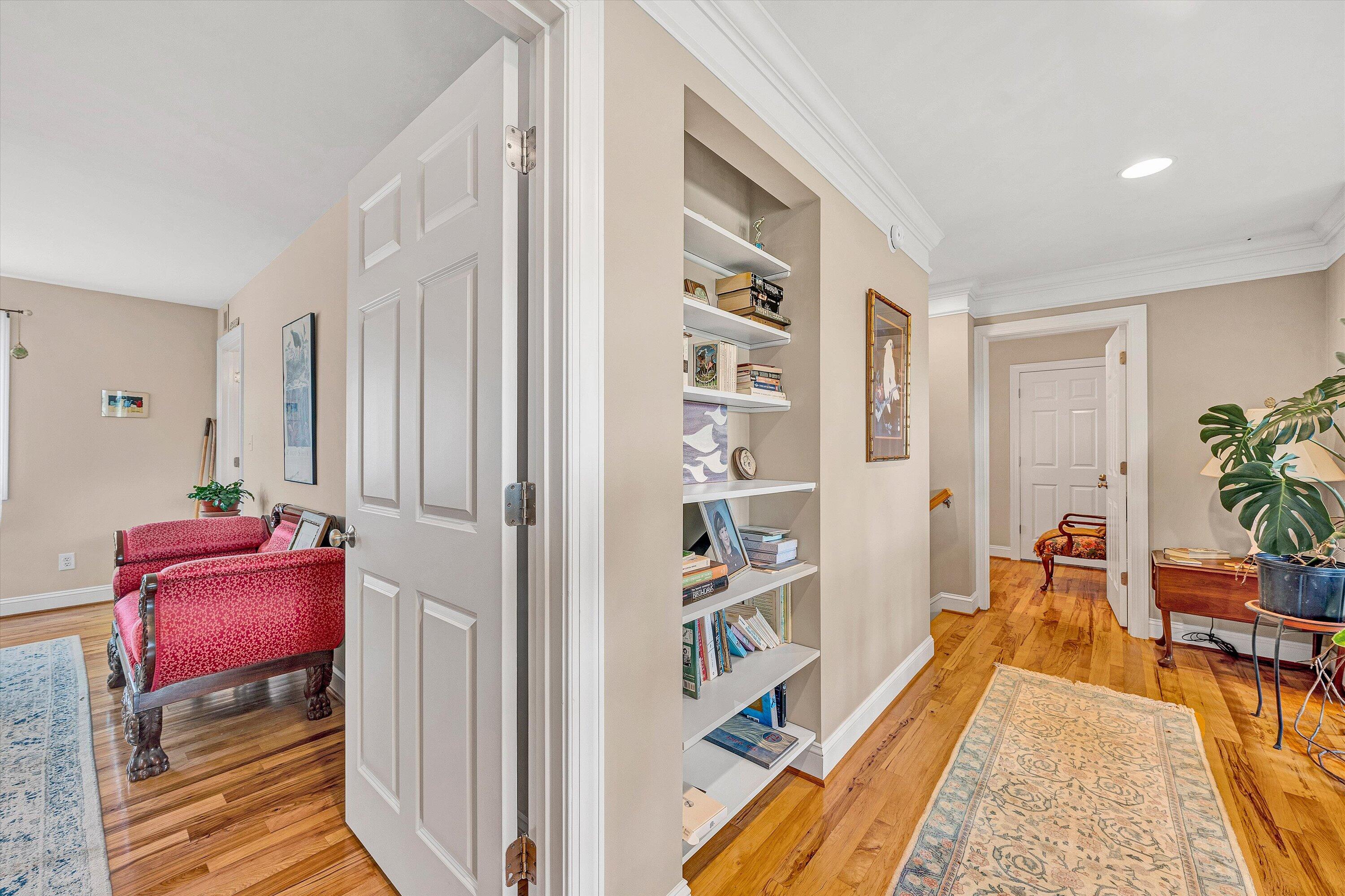 84 Green Level Road Boones Mill, VA 24065 - Photo 28 of 56 a living room with furniture a rug and a book shelf