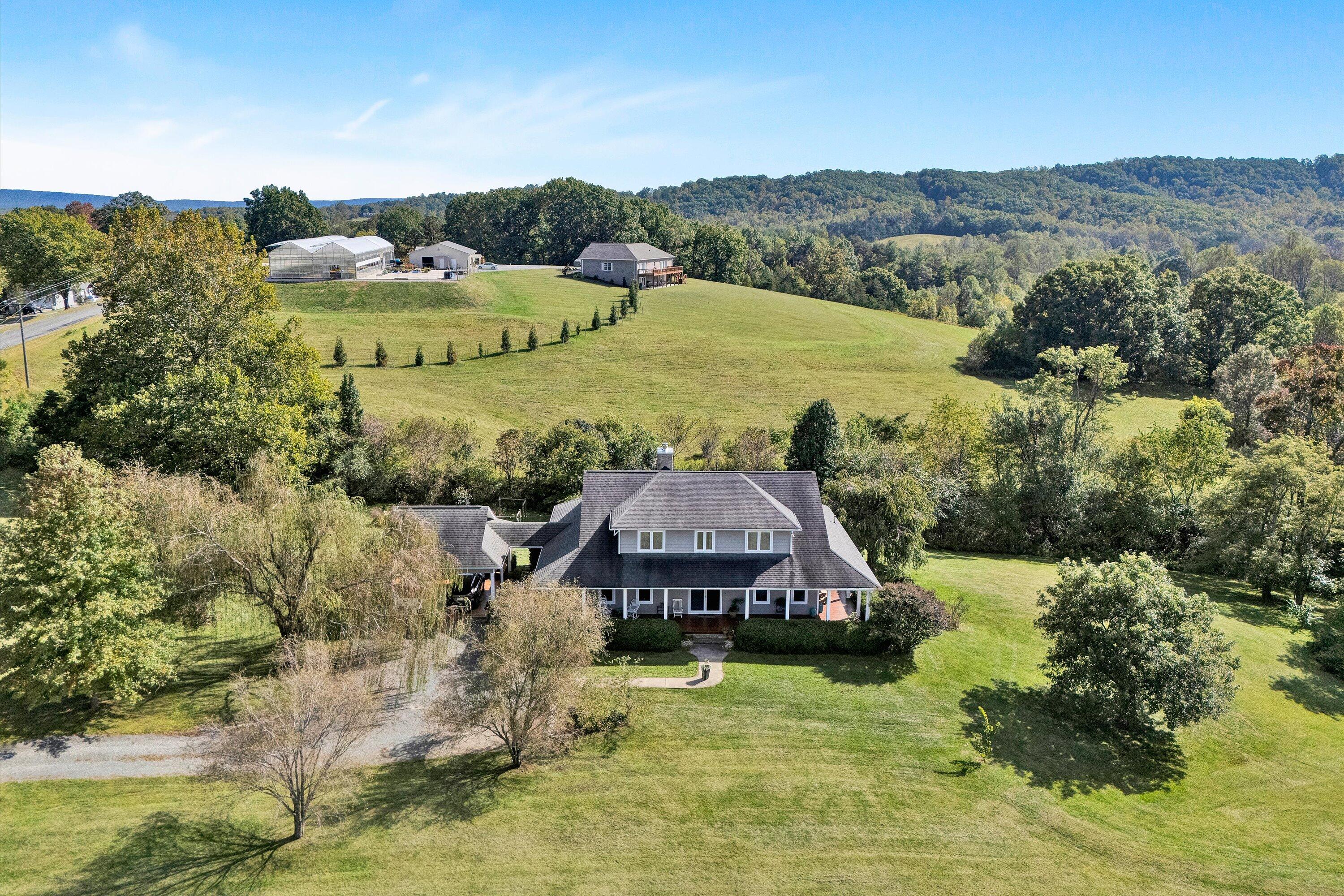 84 Green Level Road Boones Mill, VA 24065 - Photo 43 of 56 an aerial view of a house with big yard