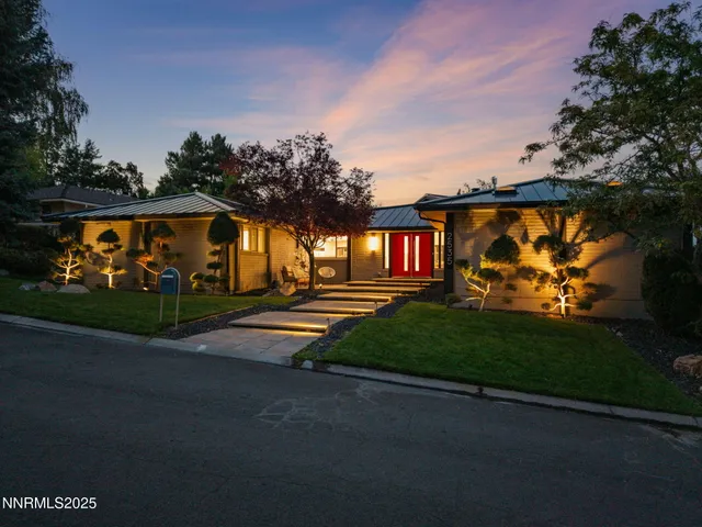a sign board with yard in the back