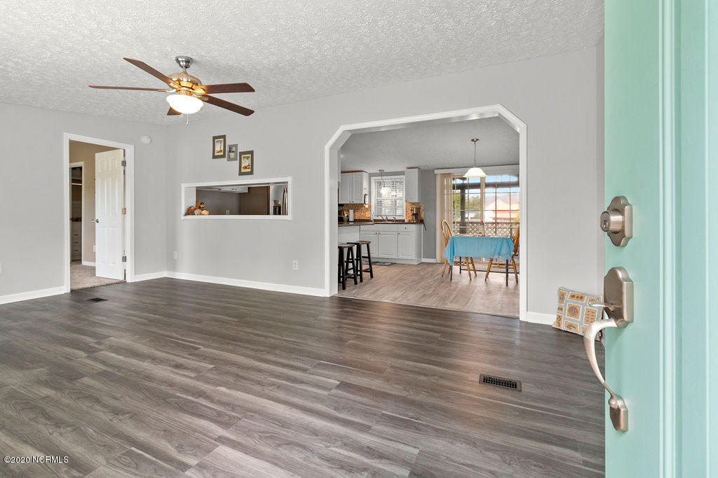 1340 Nine Foot Road Newport, NC 28570 - Photo 3 of 25 Entry into Living Room