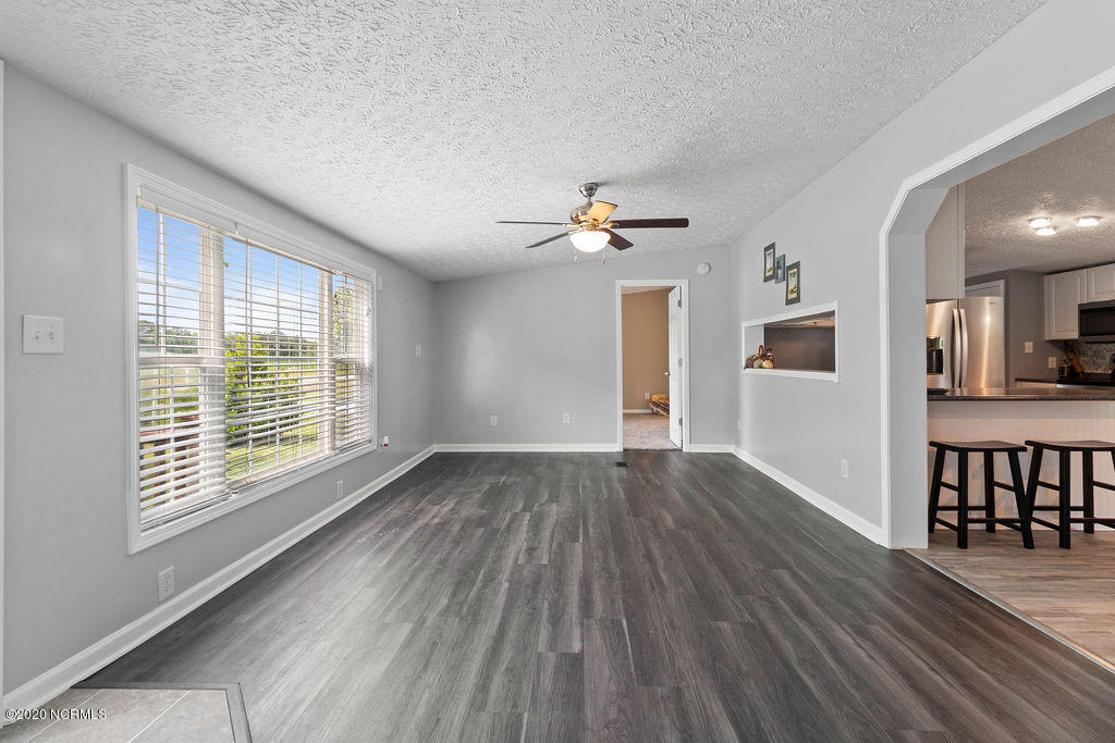 1340 Nine Foot Road Newport, NC 28570 - Photo 4 of 25 Living Room - Looking towards Master Bedroom & Dining Rm