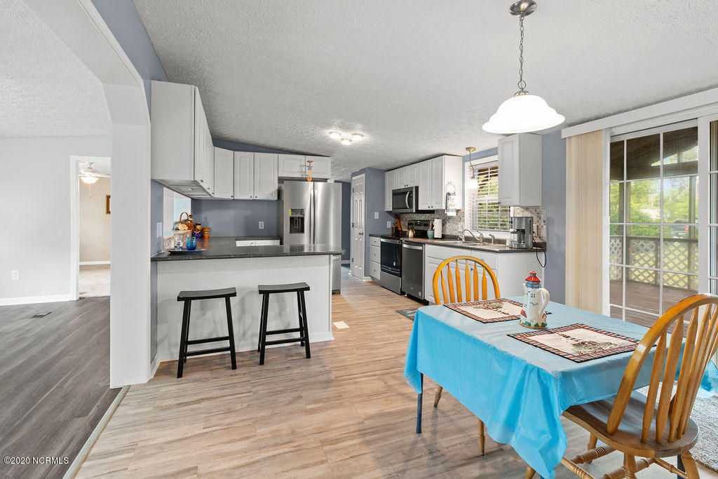 1340 Nine Foot Road Newport, NC 28570 - Photo 6 of 25 Dining Rm looking into Kitchen