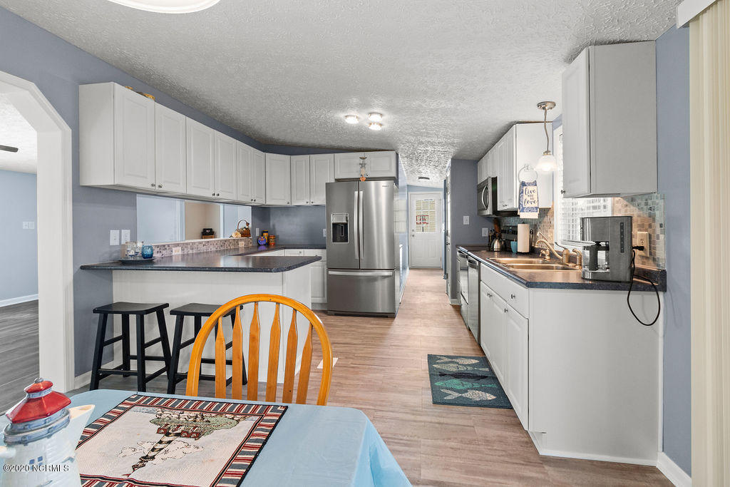 1340 Nine Foot Road Newport, NC 28570 - Photo 7 of 25 Dining Rm looking into Kitchen