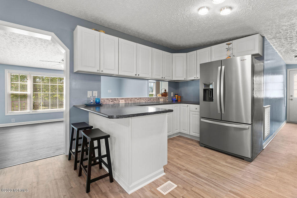 1340 Nine Foot Road Newport, NC 28570 - Photo 8 of 25 Kitchen looking into Living Rm