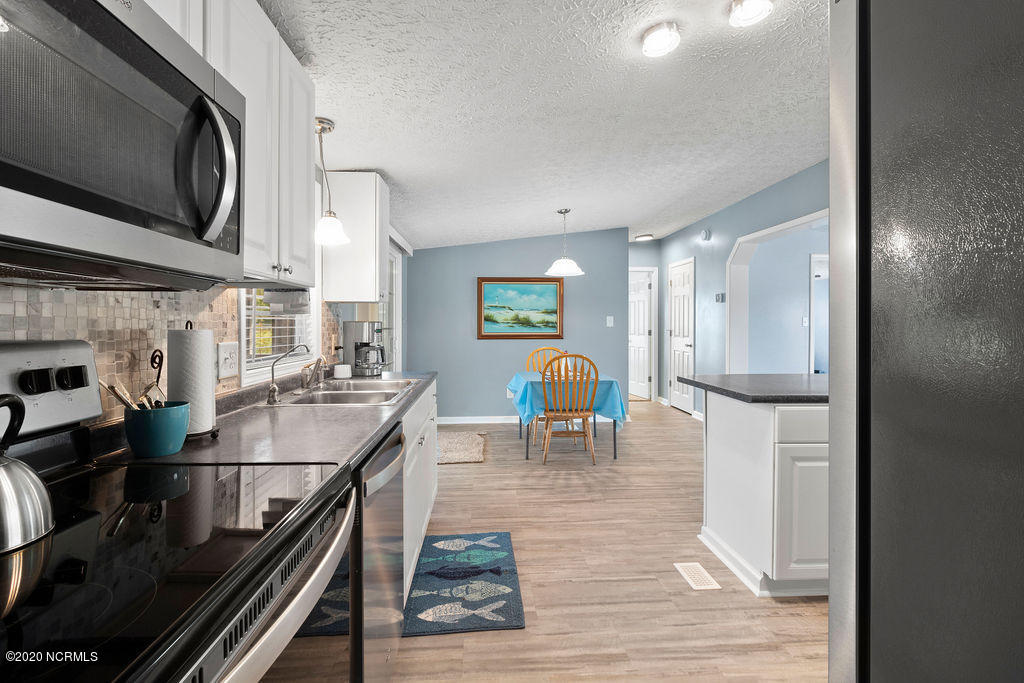 1340 Nine Foot Road Newport, NC 28570 - Photo 10 of 25 Kitchen looking into Dining Rm