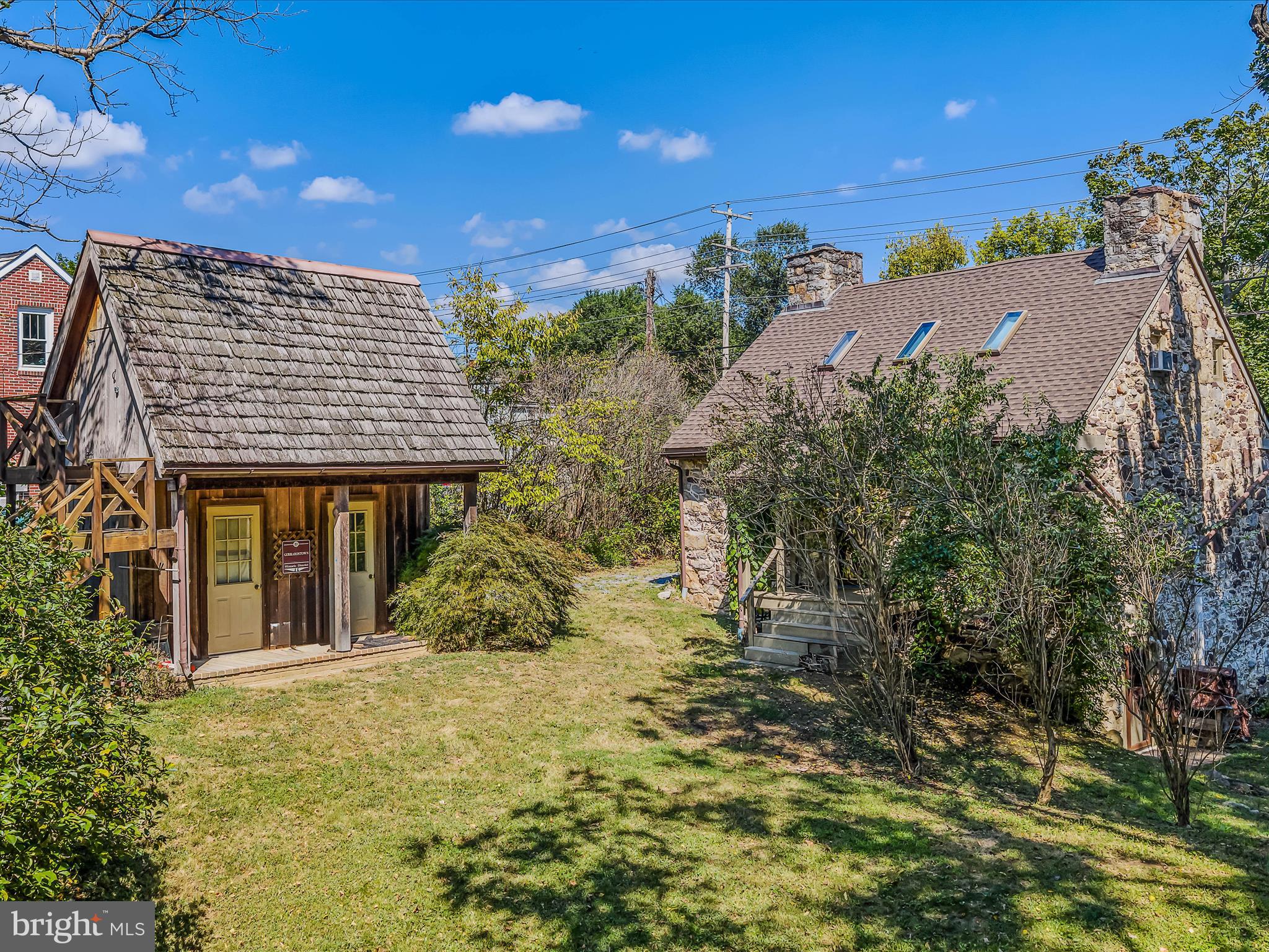 1646 Gerrardstown Road Gerrardstown, WV 25420 - Photo 23 of 37 a view of a house with a yard and potted plants