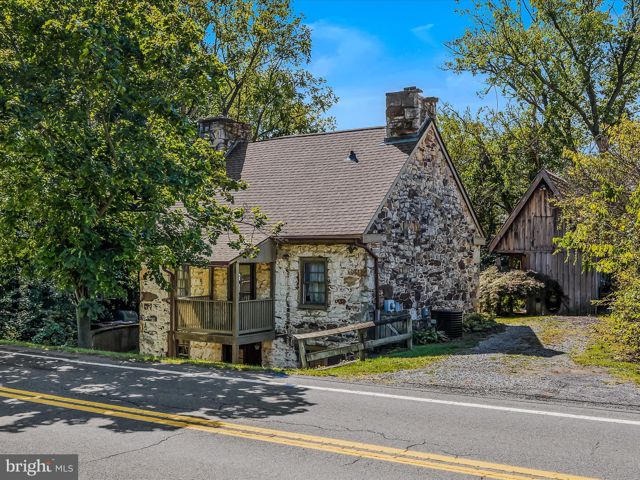 1646 Gerrardstown Road Gerrardstown, WV 25420 - Photo 4 of 37 front view of a house with a garden