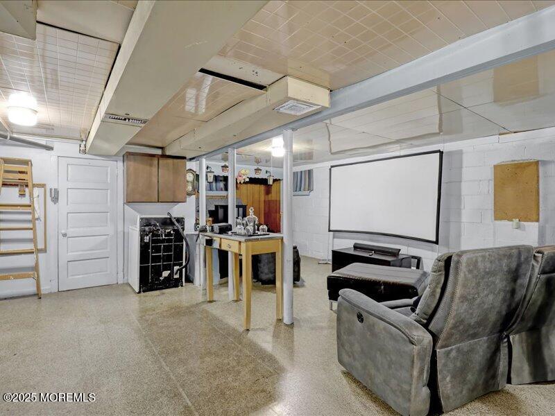 4 Knoll Terrace Hazlet, NJ 07730 - Photo 28 of 43 a view of a livingroom with furniture and a ceiling fan