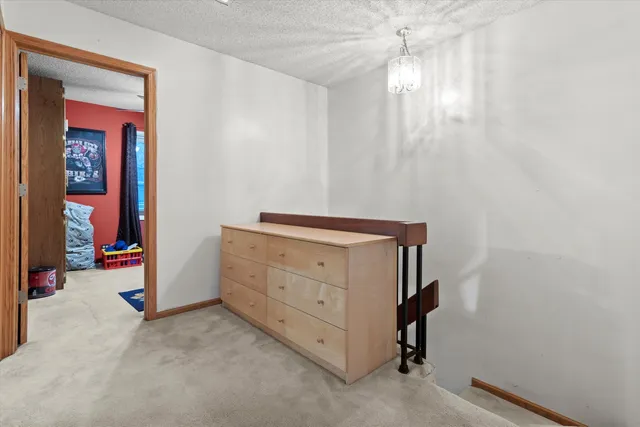 a view of a bedroom with closet