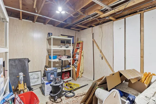 a view of a workspace with furniture