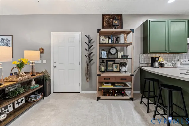 a view of workspace with furniture and wooden floor
