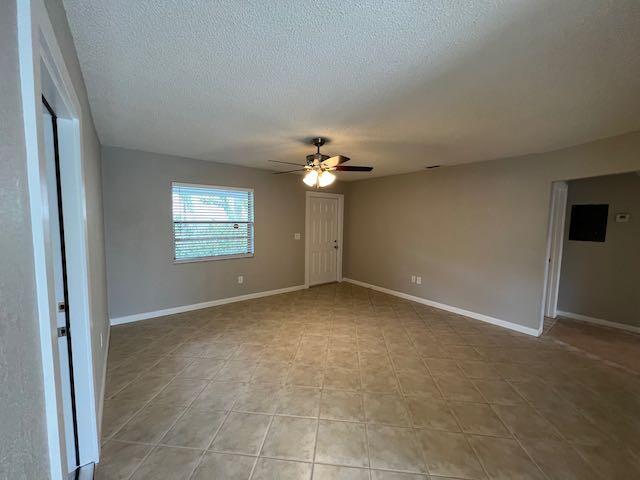 1611 Johnson Street, Unit 2 Lake Worth Beach, FL 33460 - Photo 4 of 12 a view of empty room with window