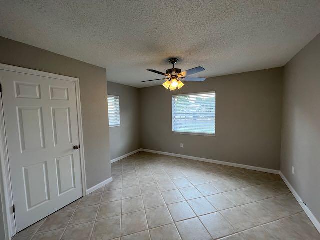 1611 Johnson Street, Unit 2 Lake Worth Beach, FL 33460 - Photo 5 of 12 a view of an empty room with a window