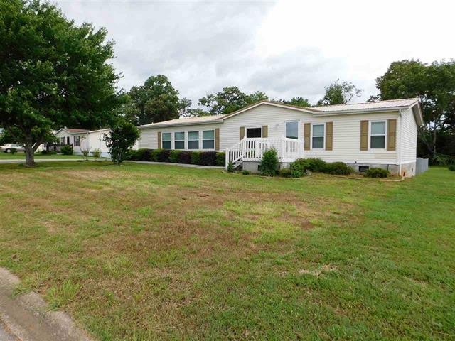 1026 Ridgeview Road, Unit 22 Maryville, TN 37801 - Photo 1 of 49 a front view of a house with a garden