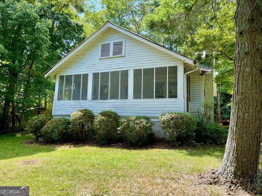 11 Daniel Road Demorest, GA 30535 - Photo 1 of 1 a view of a house with a garden