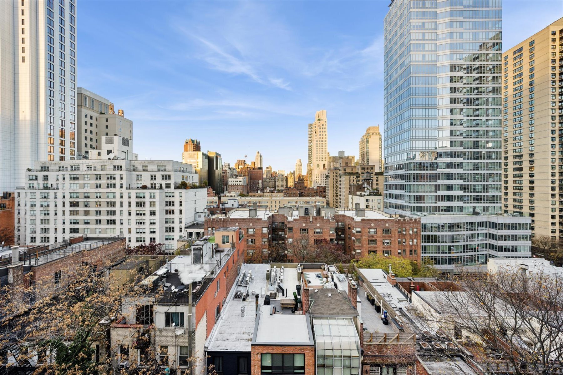 225 East 73rd Street, Unit 11D Manhattan, NY 10021 - Photo 10 of 12 a view of a city with tall buildings