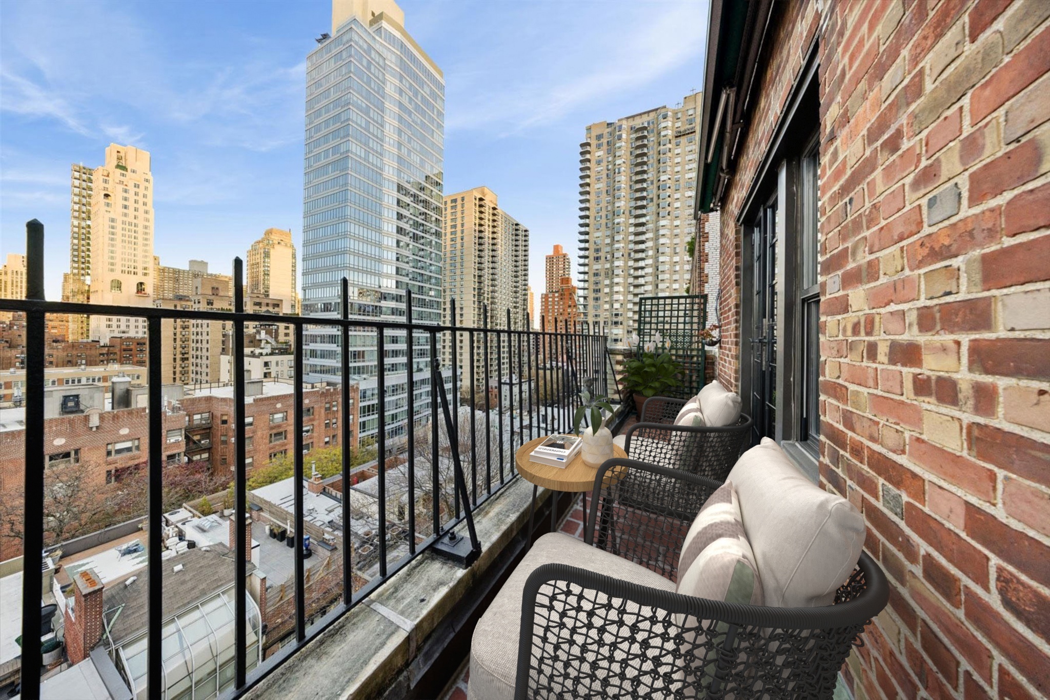 225 East 73rd Street, Unit 11D Manhattan, NY 10021 - Photo 11 of 12 a view of balcony with couch