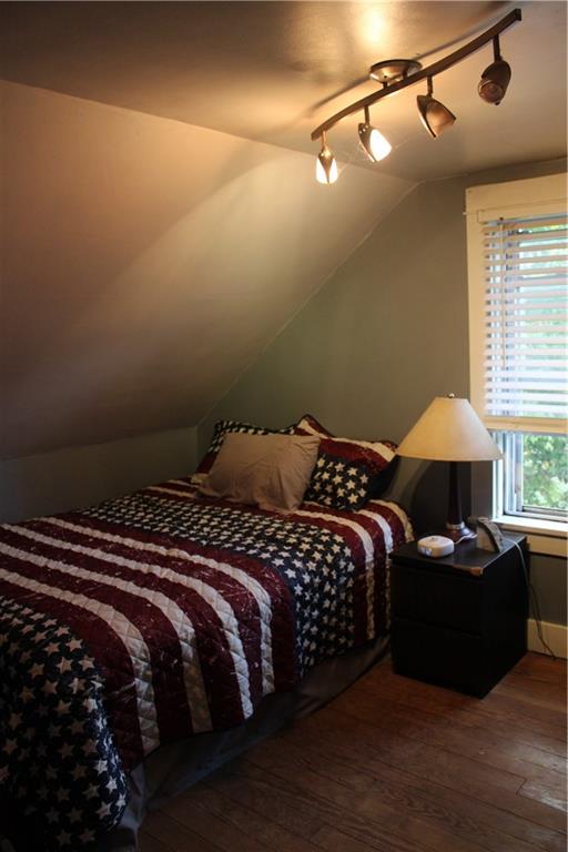 109 Country Club Road Butler, PA 16002 - Photo 13 of 18 a bedroom with a bed and a night stand