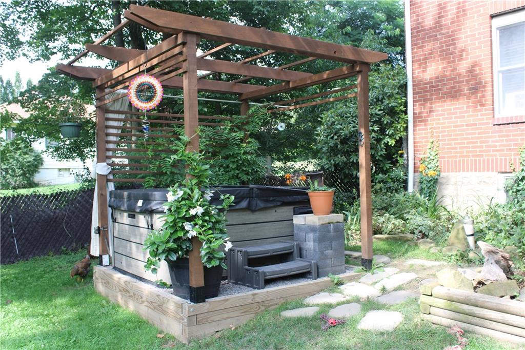 109 Country Club Road Butler, PA 16002 - Photo 4 of 18 a view of a chair and table in the garden
