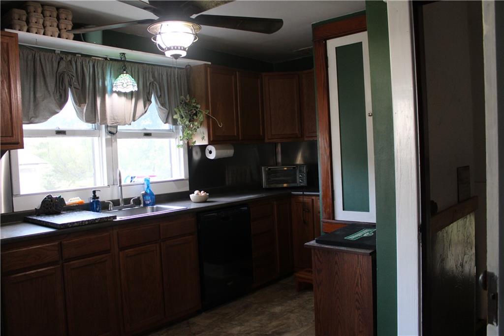 109 Country Club Road Butler, PA 16002 - Photo 10 of 18 a kitchen with a sink and cabinets