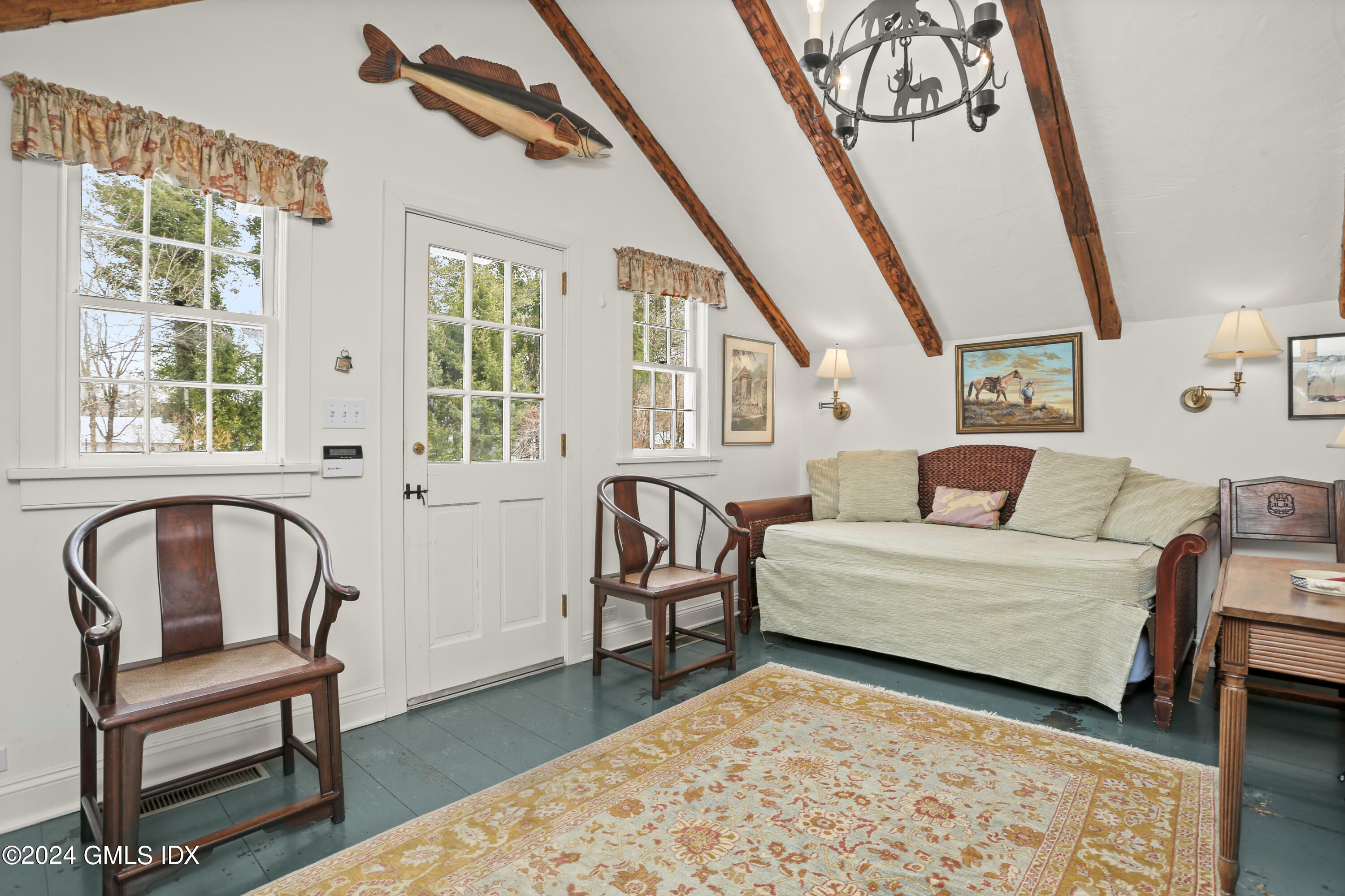 264 Taconic Road Greenwich, CT 06831 - Photo 27 of 36 a living room with furniture and a window