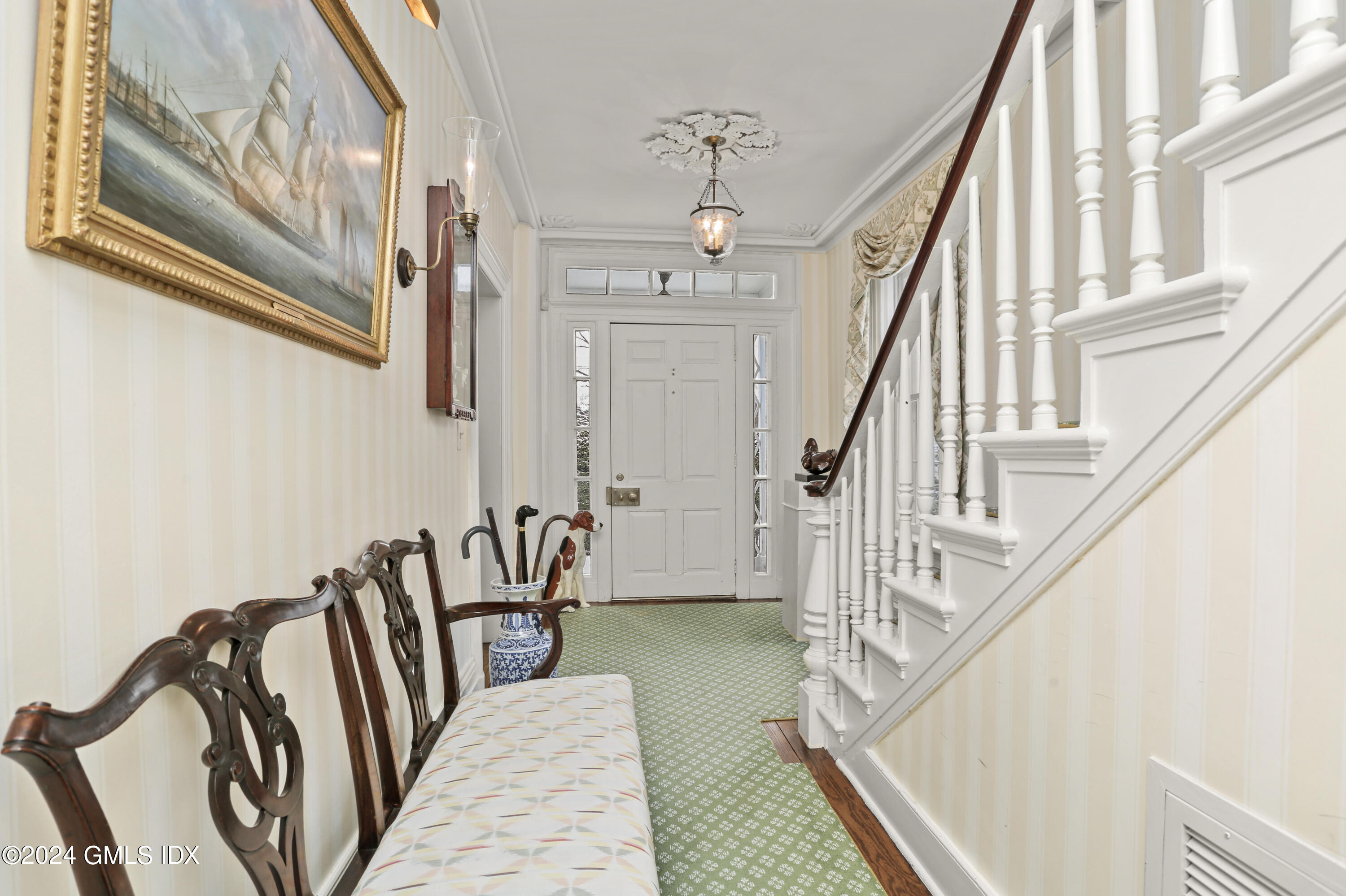 264 Taconic Road Greenwich, CT 06831 - Photo 3 of 36 a view of entryway and hall with wooden floor