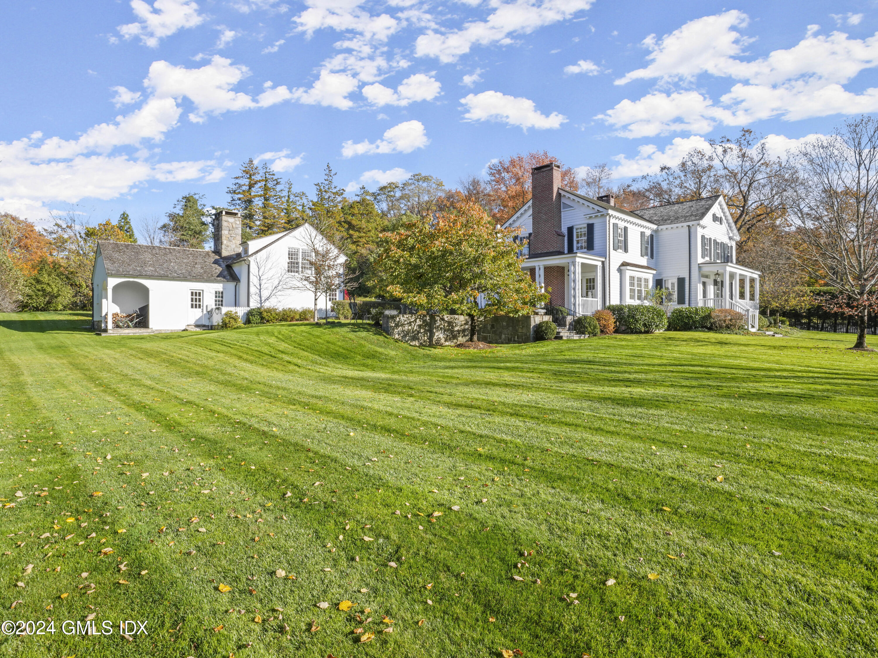264 Taconic Road Greenwich, CT 06831 - Photo 33 of 36 a view of a city with tall buildings and a big yard