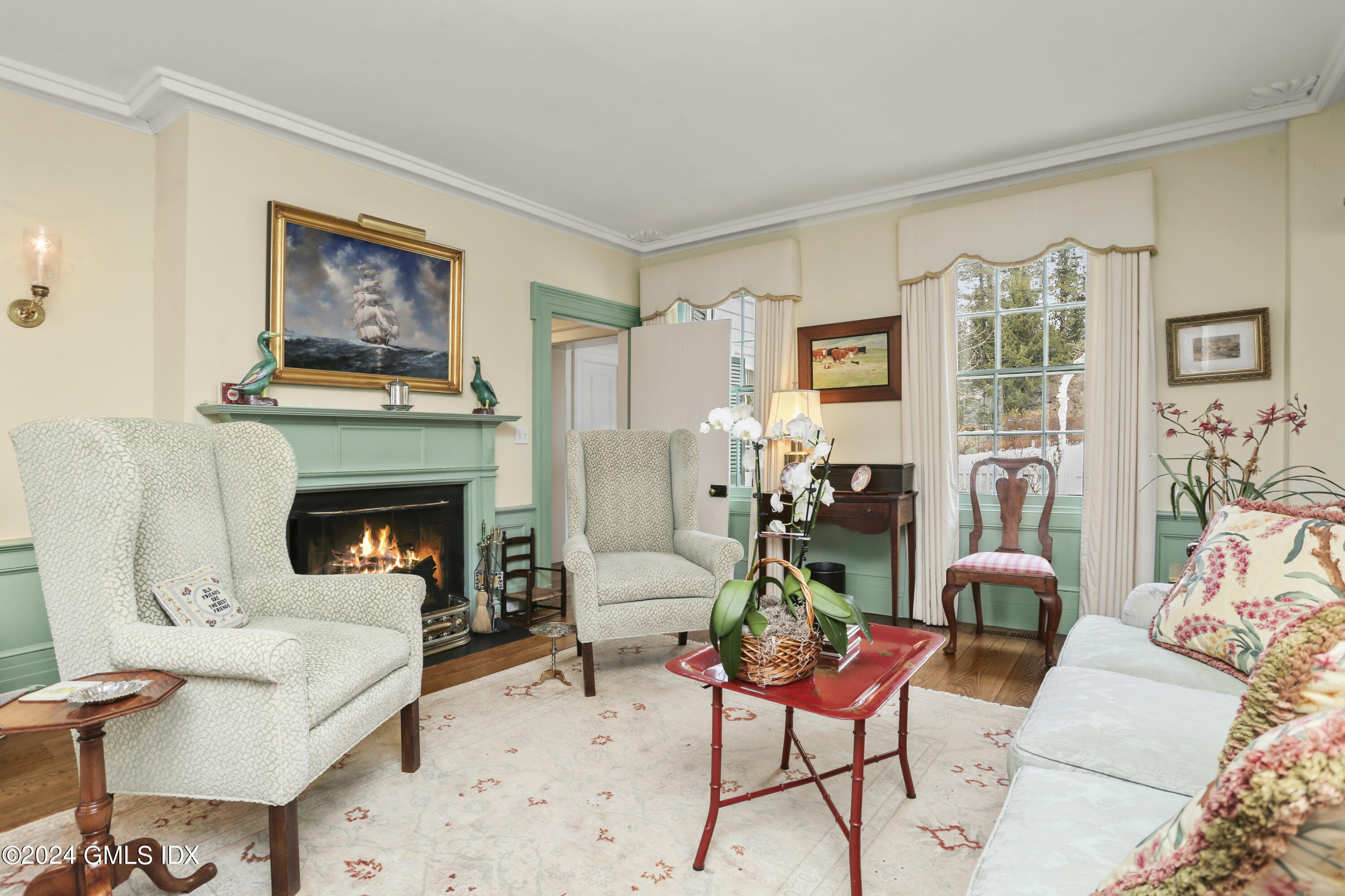 264 Taconic Road Greenwich, CT 06831 - Photo 4 of 36 a living room with furniture and a fireplace
