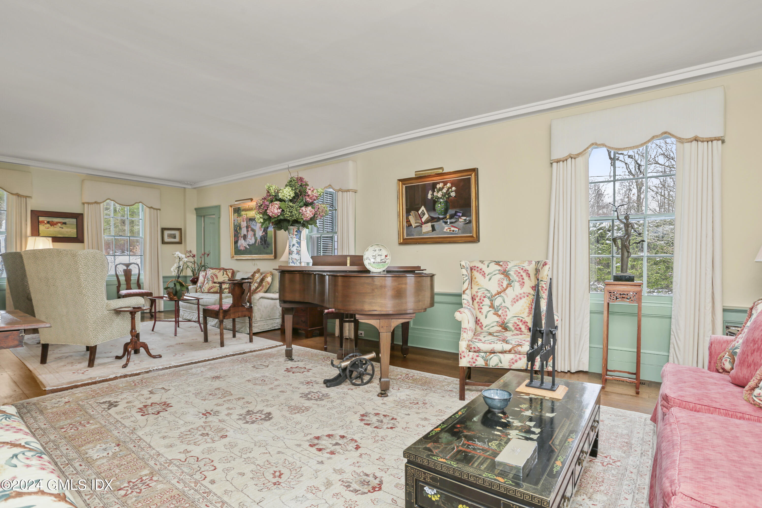 264 Taconic Road Greenwich, CT 06831 - Photo 6 of 36 a living room with furniture and a flat screen tv