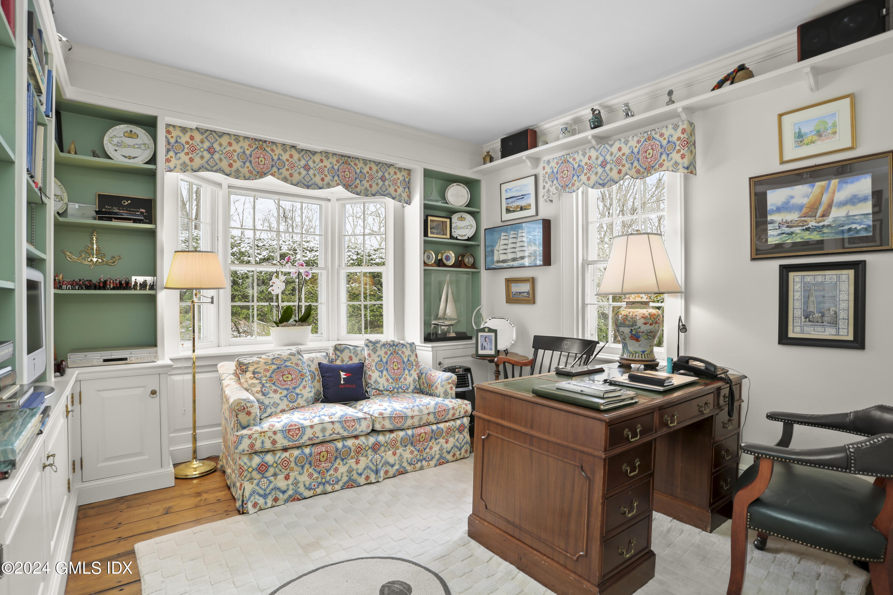 264 Taconic Road Greenwich, CT 06831 - Photo 7 of 36 a living room with furniture and large windows