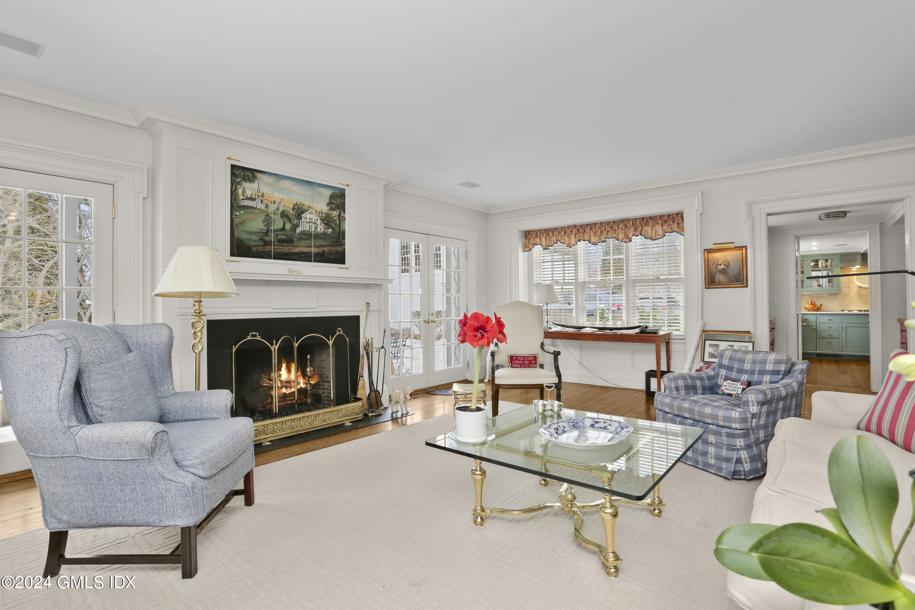 264 Taconic Road Greenwich, CT 06831 - Photo 8 of 36 a living room with furniture and a fireplace