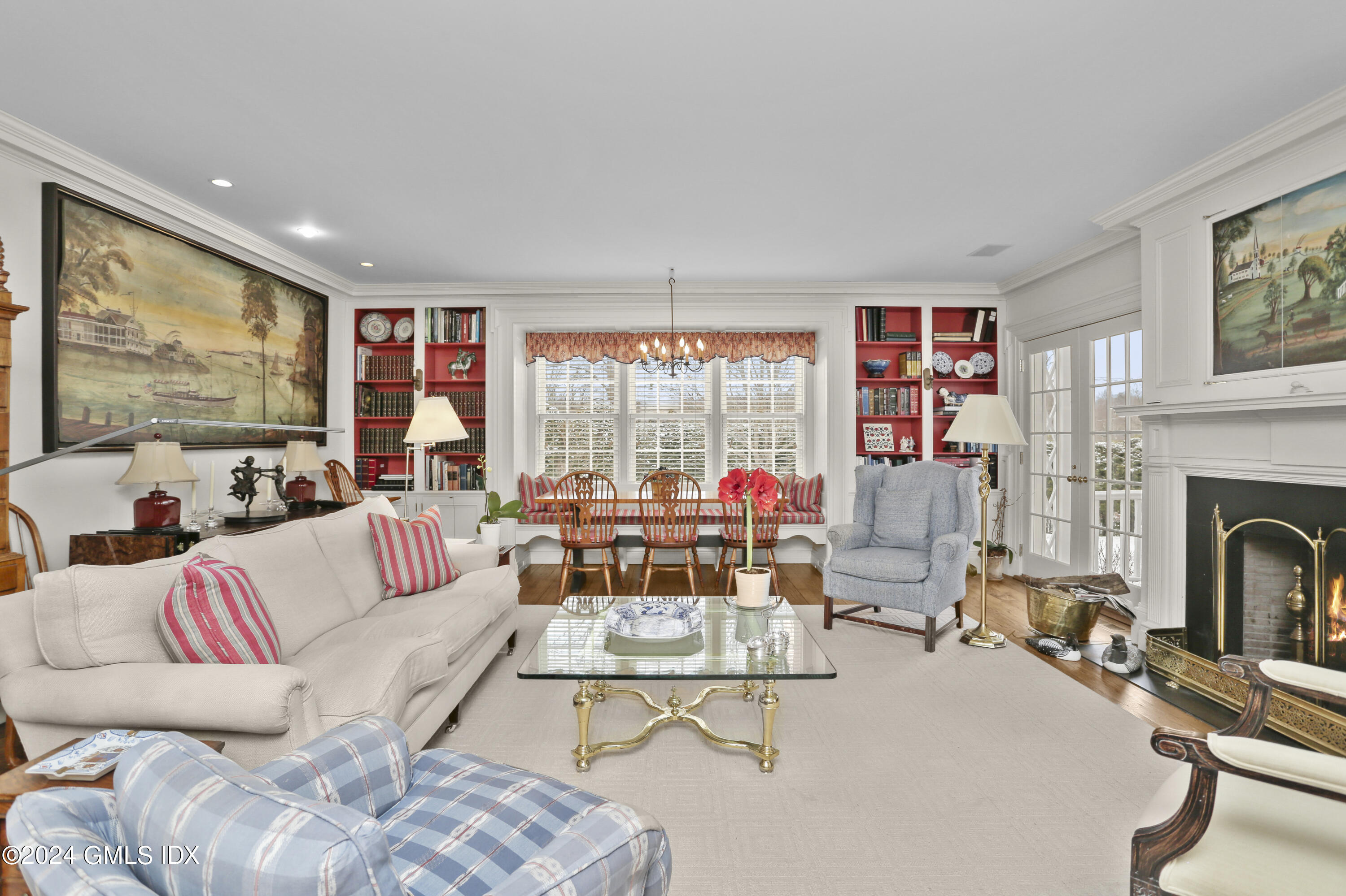 264 Taconic Road Greenwich, CT 06831 - Photo 10 of 36 a living room with furniture and a flat screen tv